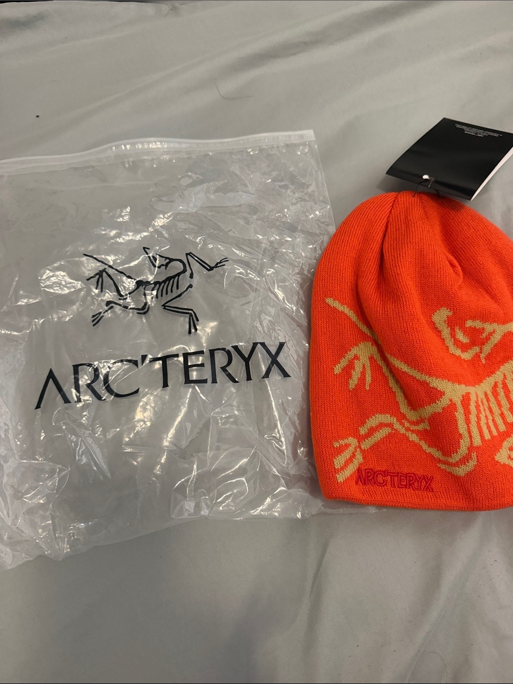 Arc'teryx Kids Bright Orange Beanie with Yellow Logo